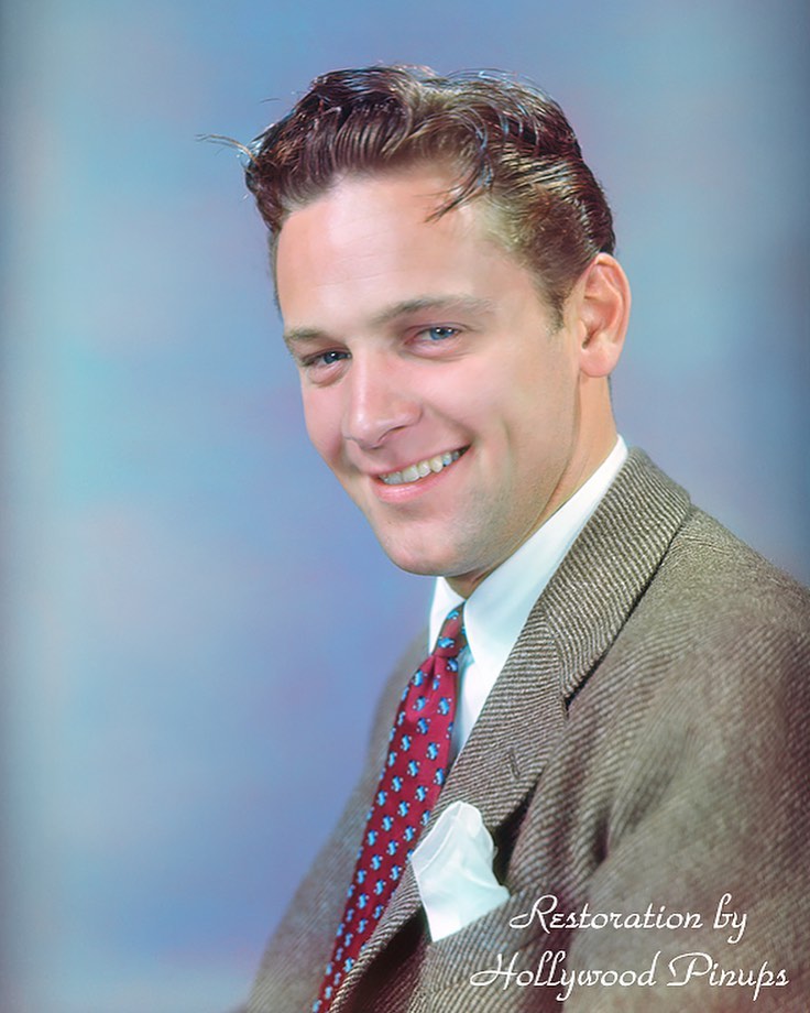 A high-resolution, black and white studio portrait of actor William Holden with a slicked-back hairstyle, wearing a light-colored button-down shirt. The bottom left corner features a handwritten dedication and signature in black ink addressed to Eileen.