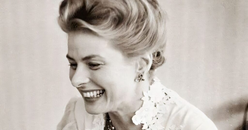 A high-contrast black and white close-up portrait of Ingrid Bergman looking thoughtfully into the distance.